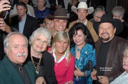 (L-R) Bob Whitaker (Former Grand Ole Opry Mgr.), Jeannie Pruett, Jett Williams, Dixie Harrison and Moe Bandy Behind front row (L-R) Allen Karl and David Church